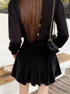 Black velvet A-line skort with pleats and pockets
