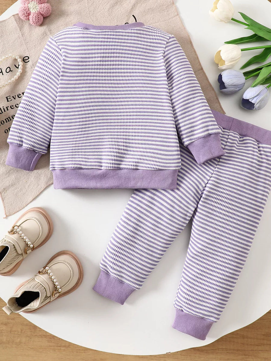 pajama set in white with striped and chenille patch