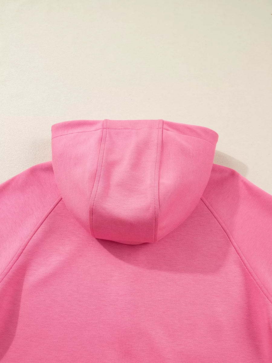 Dusty pink relaxed fit zip-up hoodie with a drawstring hood detail