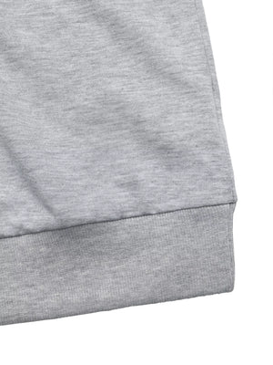 Gray sweater with ribbed hem detail.