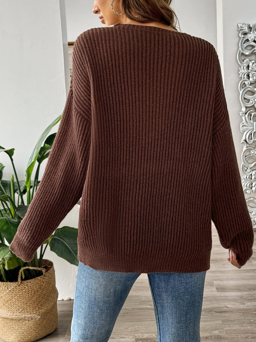 100% acrylic Care instructions: Machine wash cold v-neck sweater in Dark Brown with relaxed silhouette