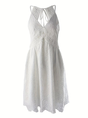 White eyelet lace V-neck mini dress with tie back and cutout details