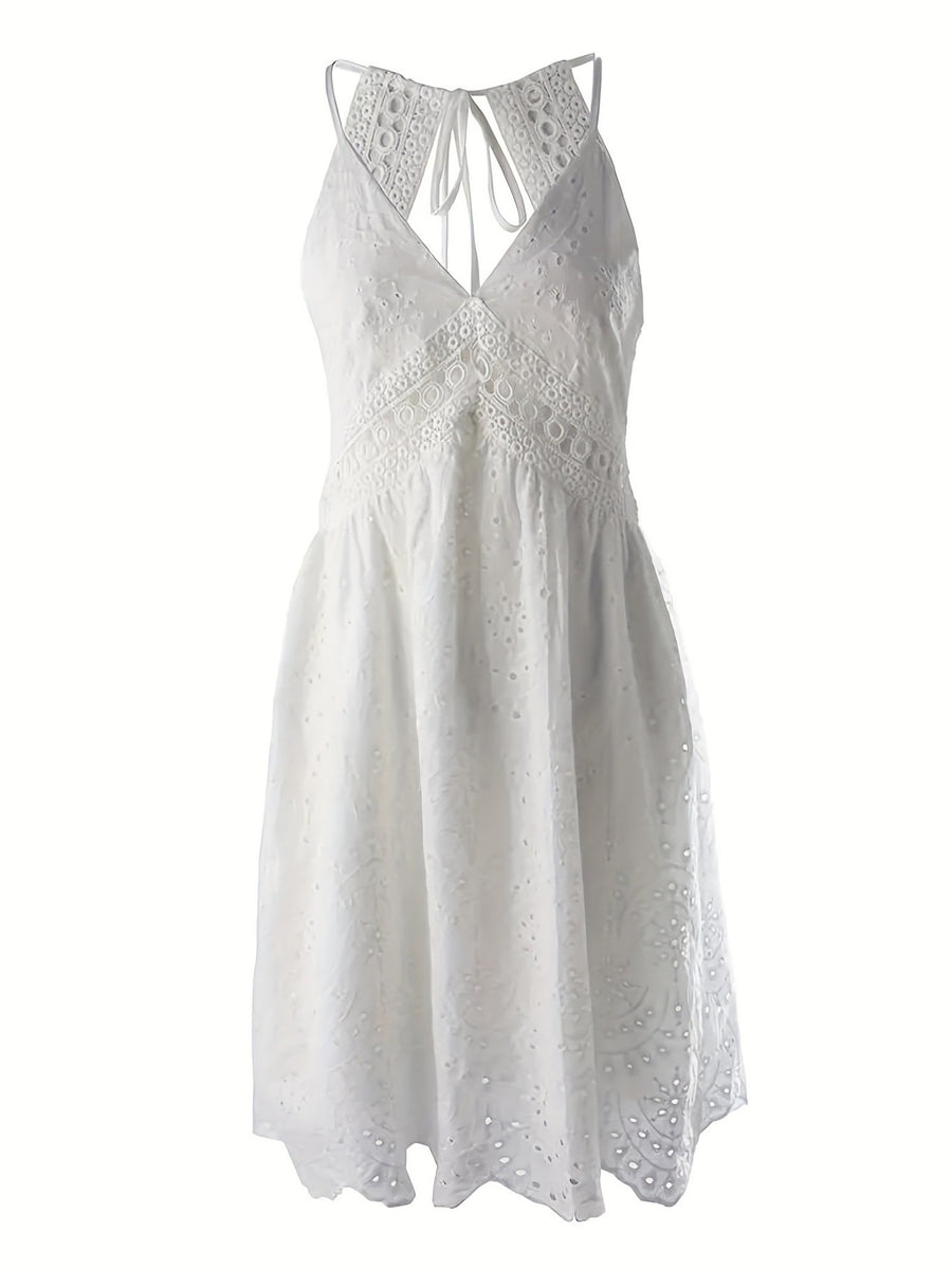 White eyelet lace V-neck mini dress with tie back and cutout details