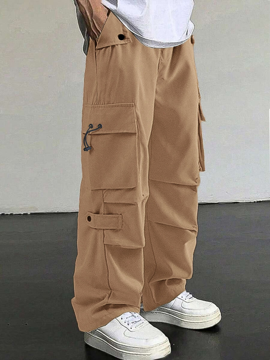 Brown cargo pants with multiple pockets and drawstring details.