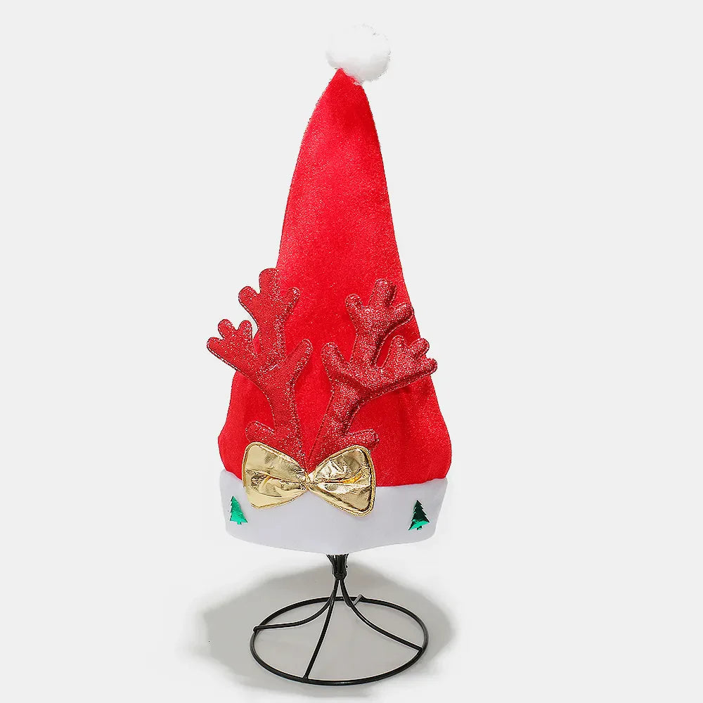 Red festive party hat with glitter antlers and gold bow, white trim with trees.