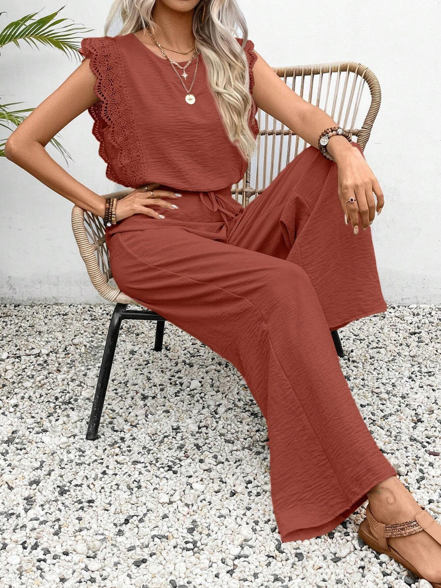 Terracotta textured jumpsuit with ruffle lace sleeves and drawstring waist