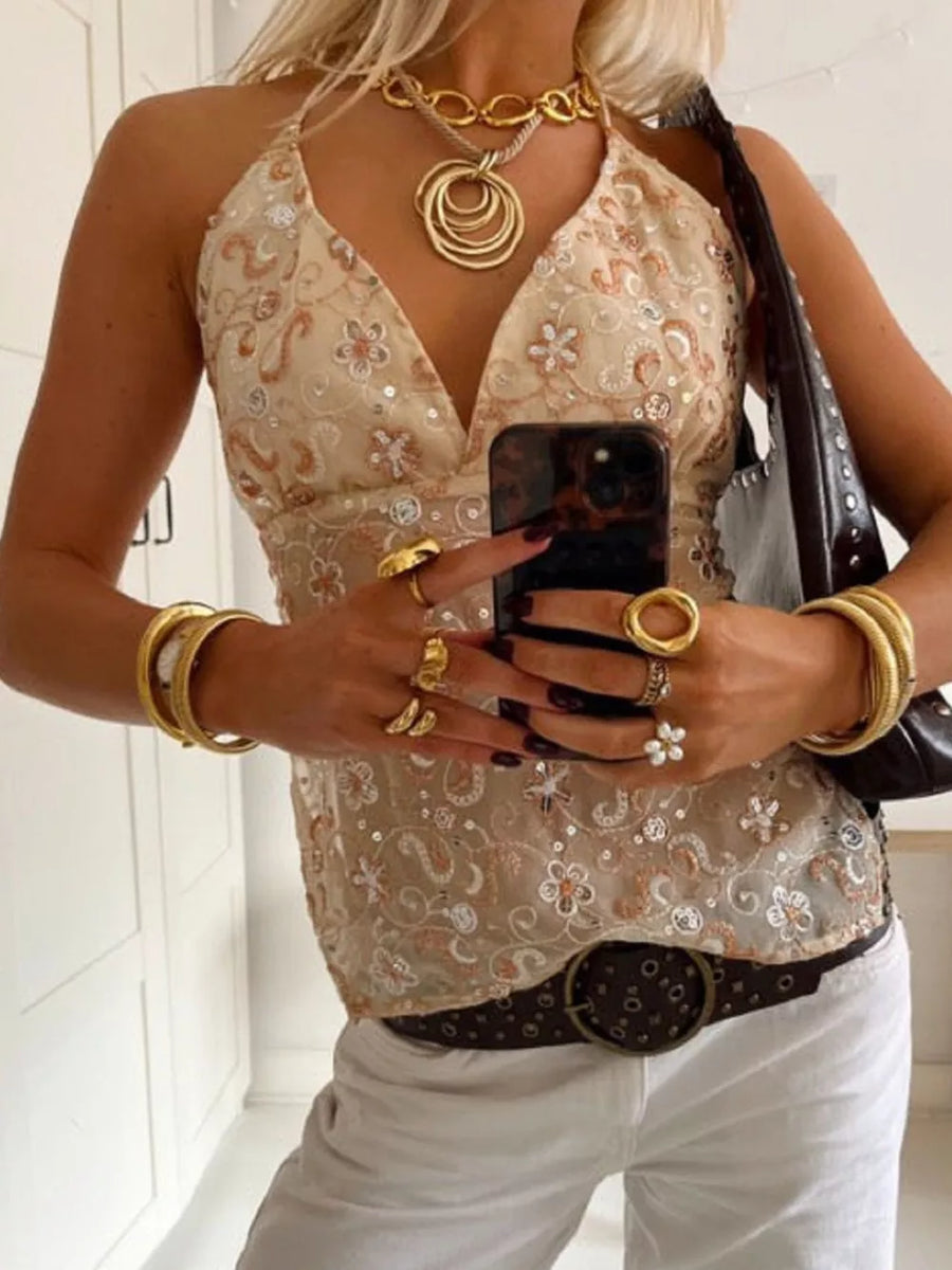 Gold embroidered halter neck cami top with sequin details and a deep V-neck.