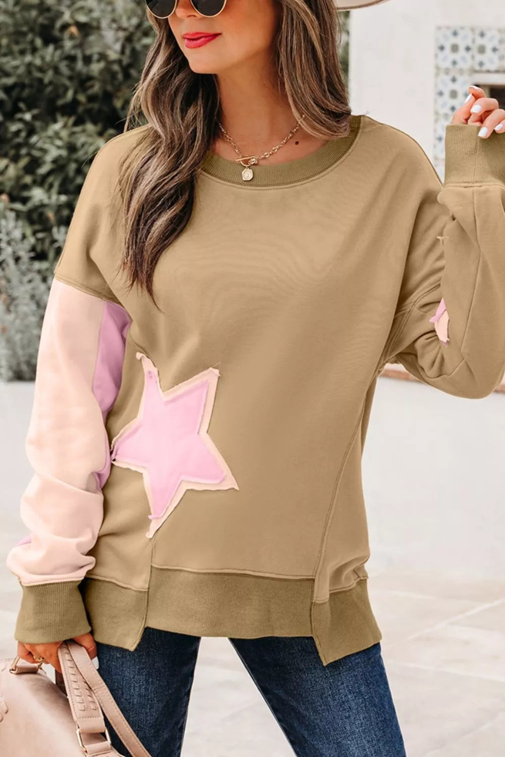 sweatshirt featuring star in blush pink with 65% polyester, 35% cotton， Care instructions: Machine wash cold texture
