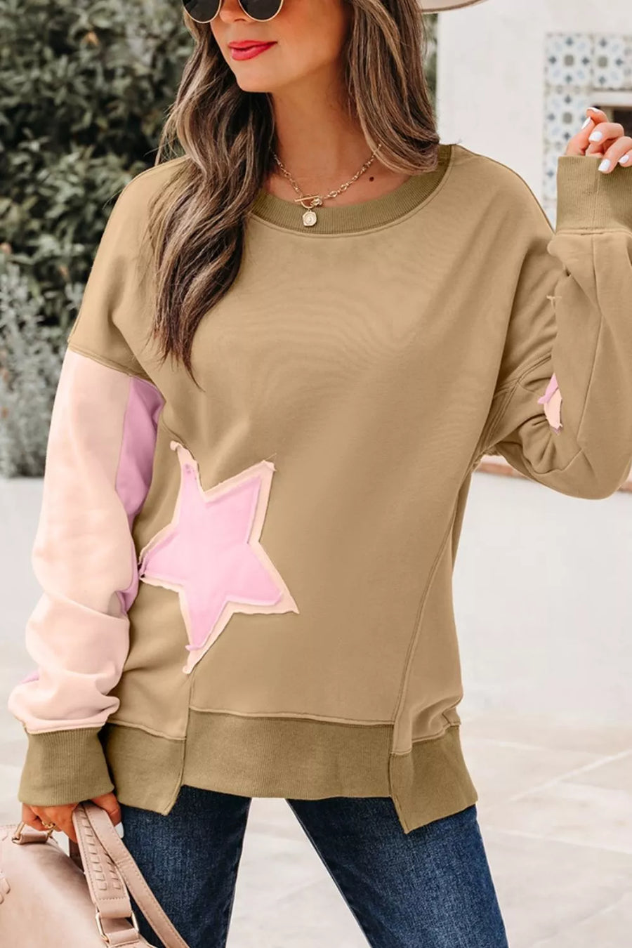 sweatshirt featuring star in blush pink with 65% polyester, 35% cotton， Care instructions: Machine wash cold texture