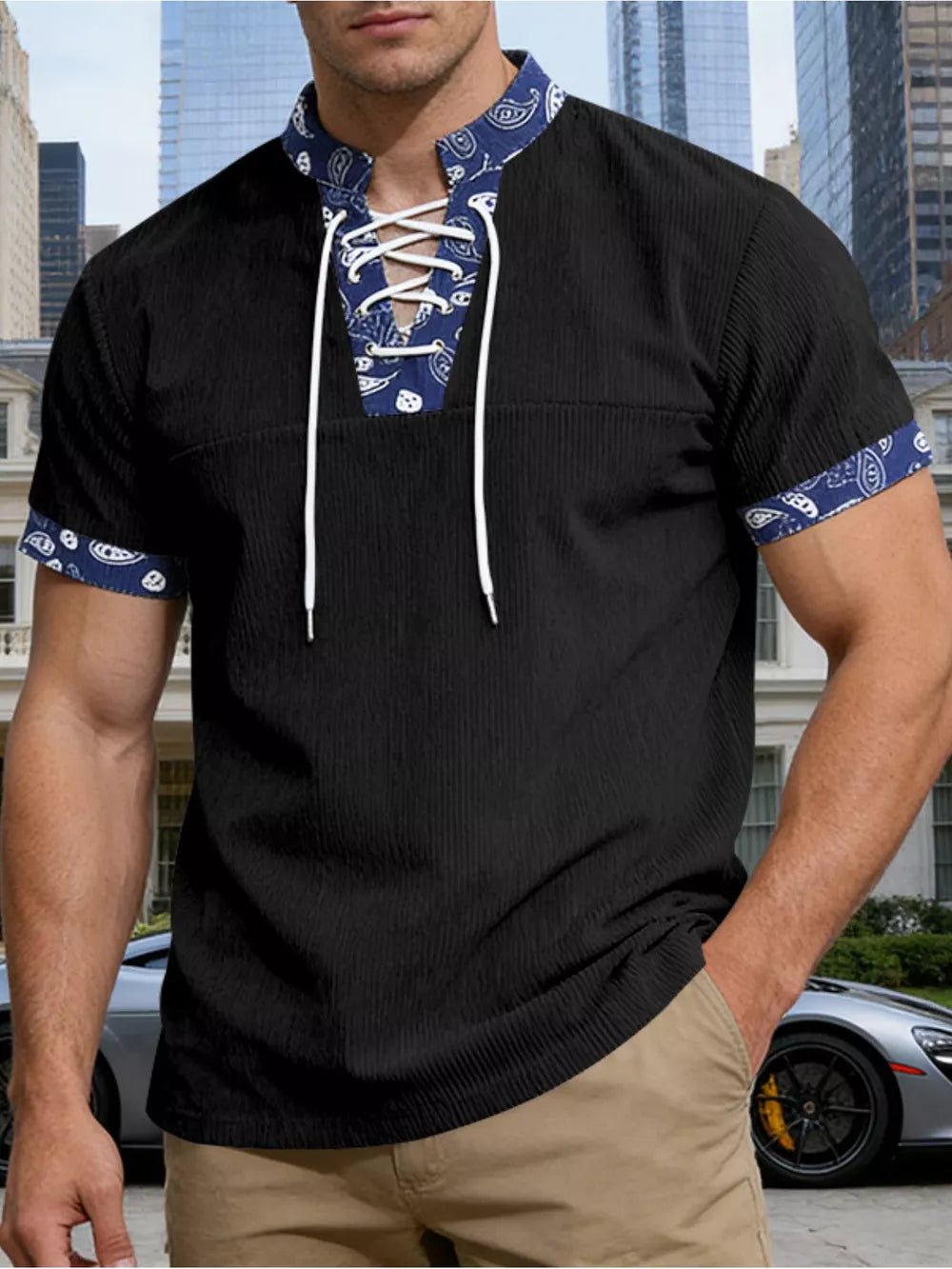Black men's t-shirt with lace-up collar and paisley details on collar and sleeves.