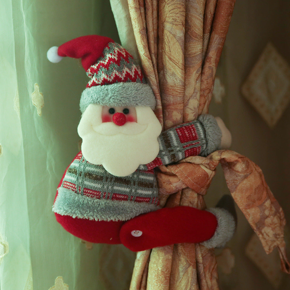 Festive Santa curtain tieback with red, grey, and white patterned sweater and hat.