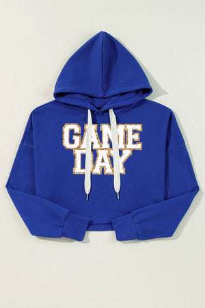 Royal blue cropped hoodie with glitter "GAME DAY" graphic and white drawstrings.