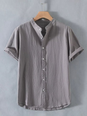 Grey short sleeve button-up shirt with band collar and rolled cuffs