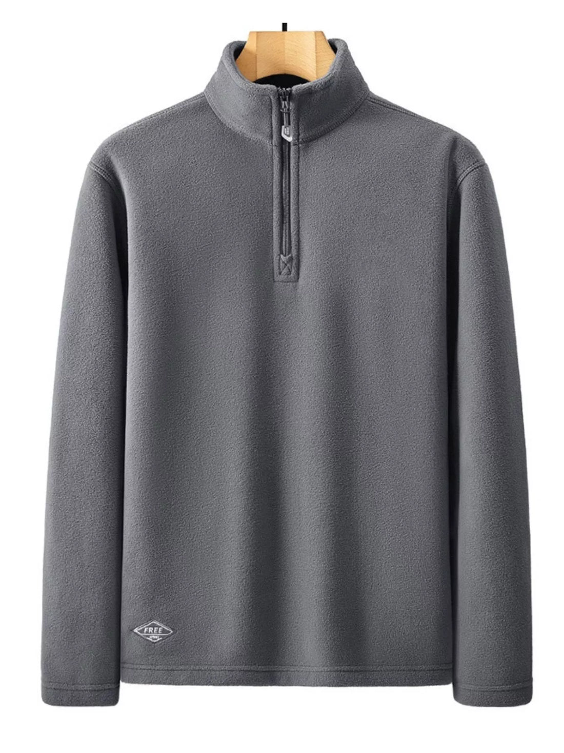 Men's gray fleece quarter zip sweatshirt with a small embroidered logo on the hem.