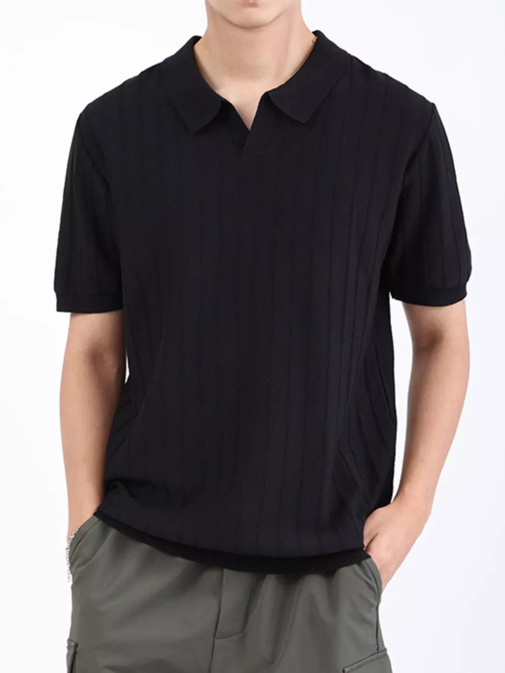 Men's black ribbed knit short sleeve polo shirt with a spread collar.