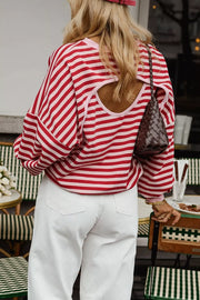 red sweatshirt with hip-length and pullover
