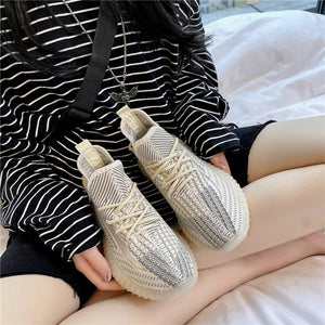 Textured knit platform sneakers in Light with lace-up closure and ribbed detailing.