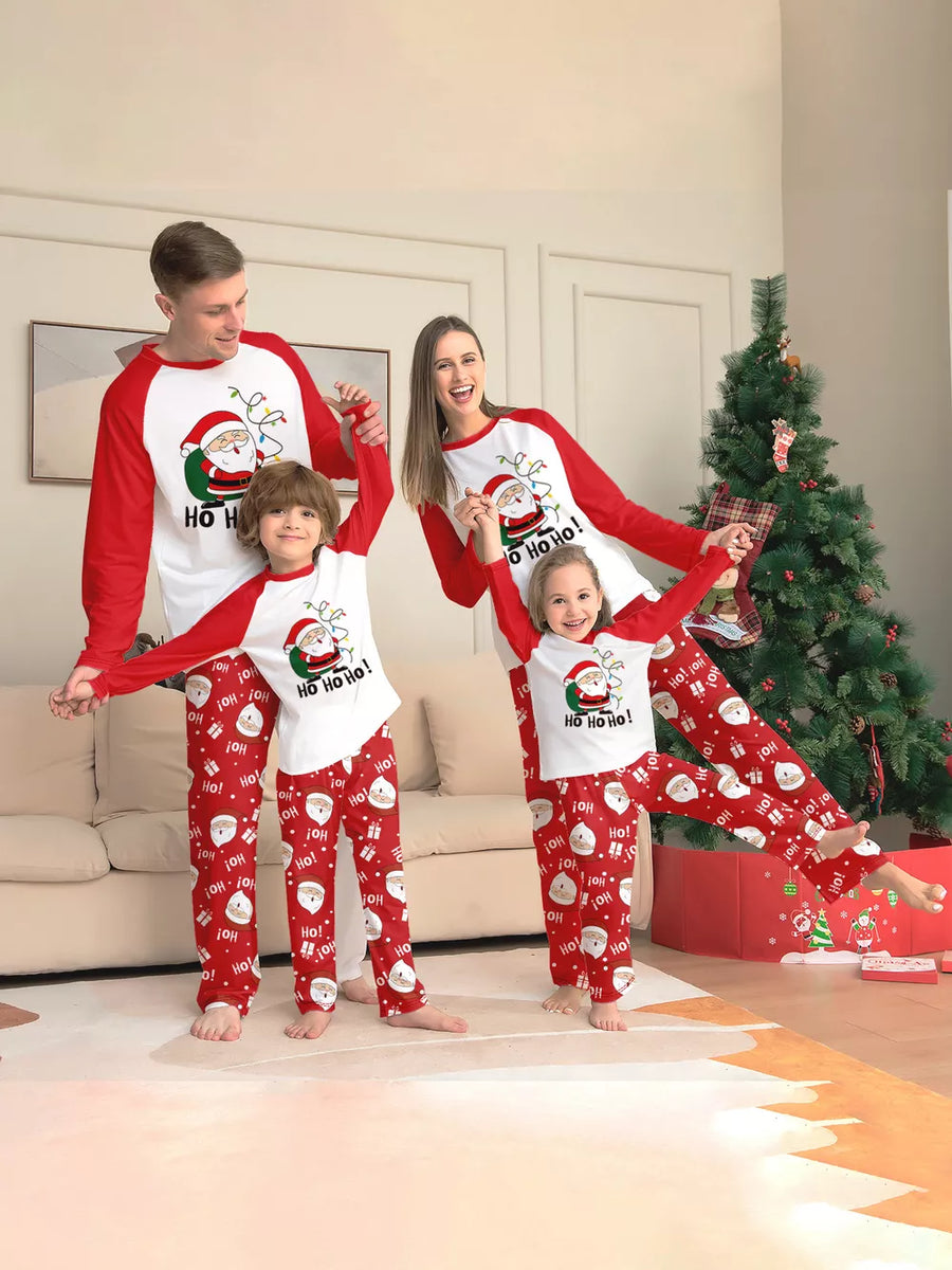 red pajama set with graphic print and crew neck