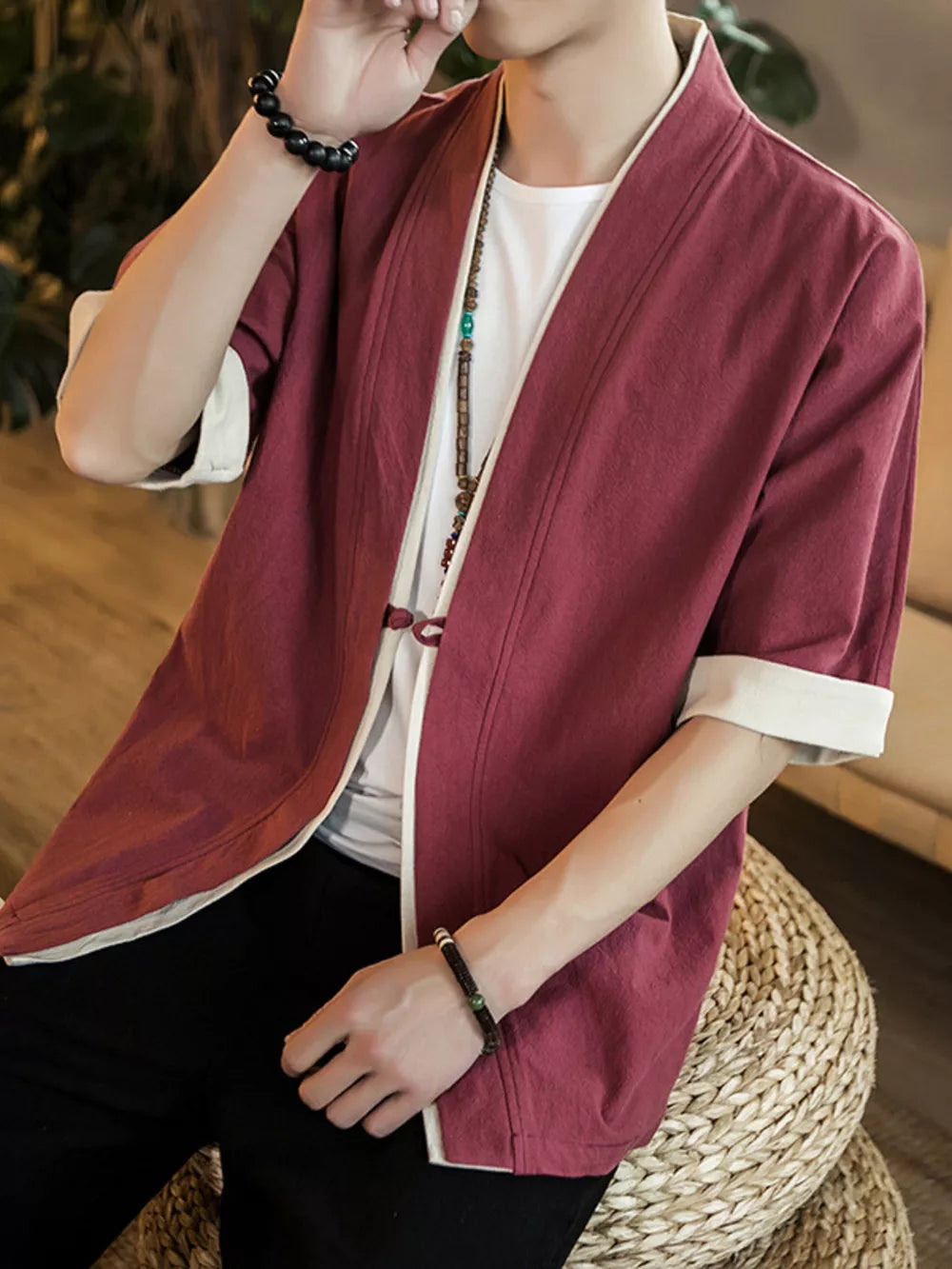 Burgundy cotton half sleeve shirt with contrast trim and open neckline.