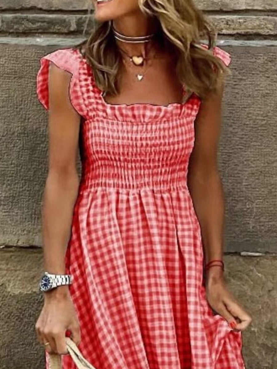 Ruffled sleeve maxi dress in red gingham with shirred bodice and square neckline.