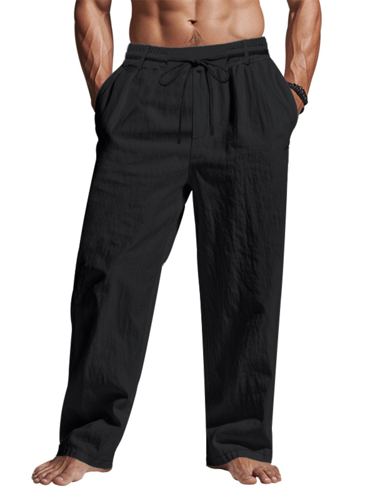 wide-leg pants in black featuring drawstring waist and loose fit