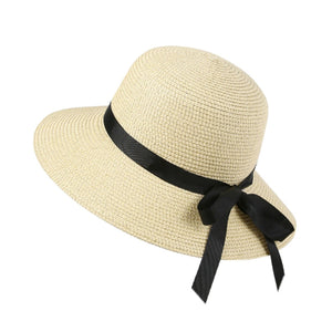 Beige straw sun hat with wide brim and black bow detail.