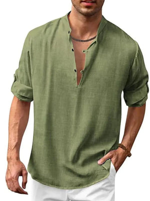 Moss green linen henley shirt with mandarin collar and roll-up sleeves.