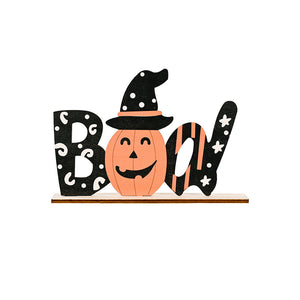 Halloween word block trio with pumpkin wearing witch hat, black letters with white polka dots and stripes.
