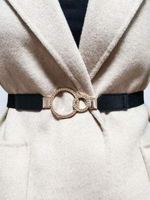 Black elastic belt with interlocked gold rings and crystal detail buckle