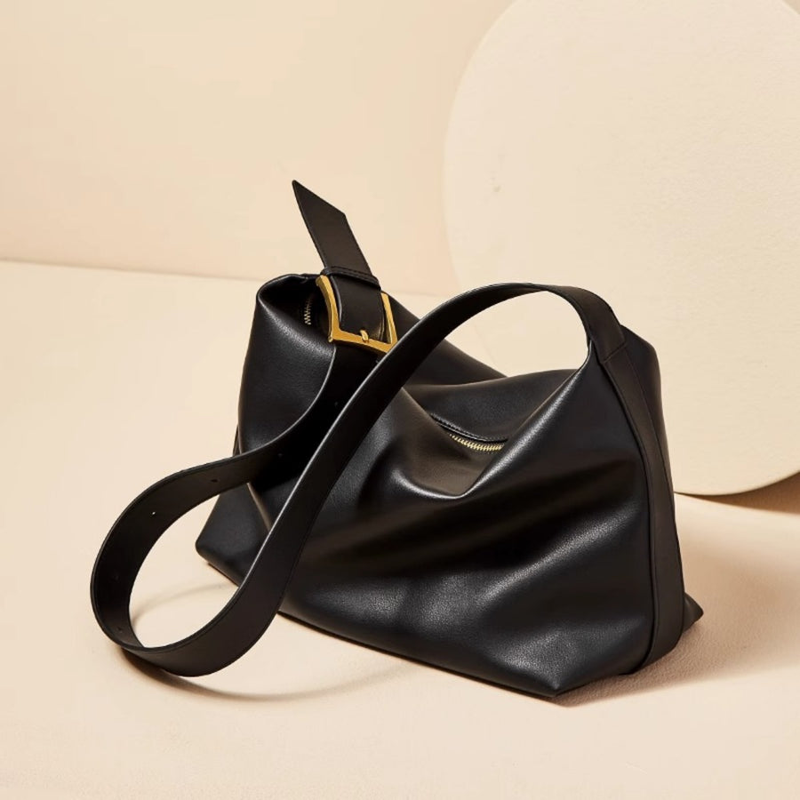 Black pu leather shoulder bag with gold buckle detail and zipper closure