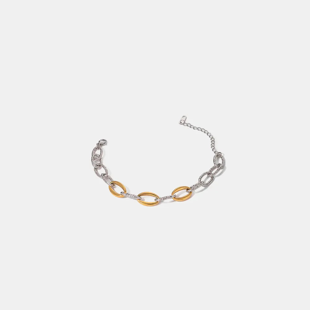 Two-tone link bracelet with oval gold accents and silver chain, 18K gold-plated.
