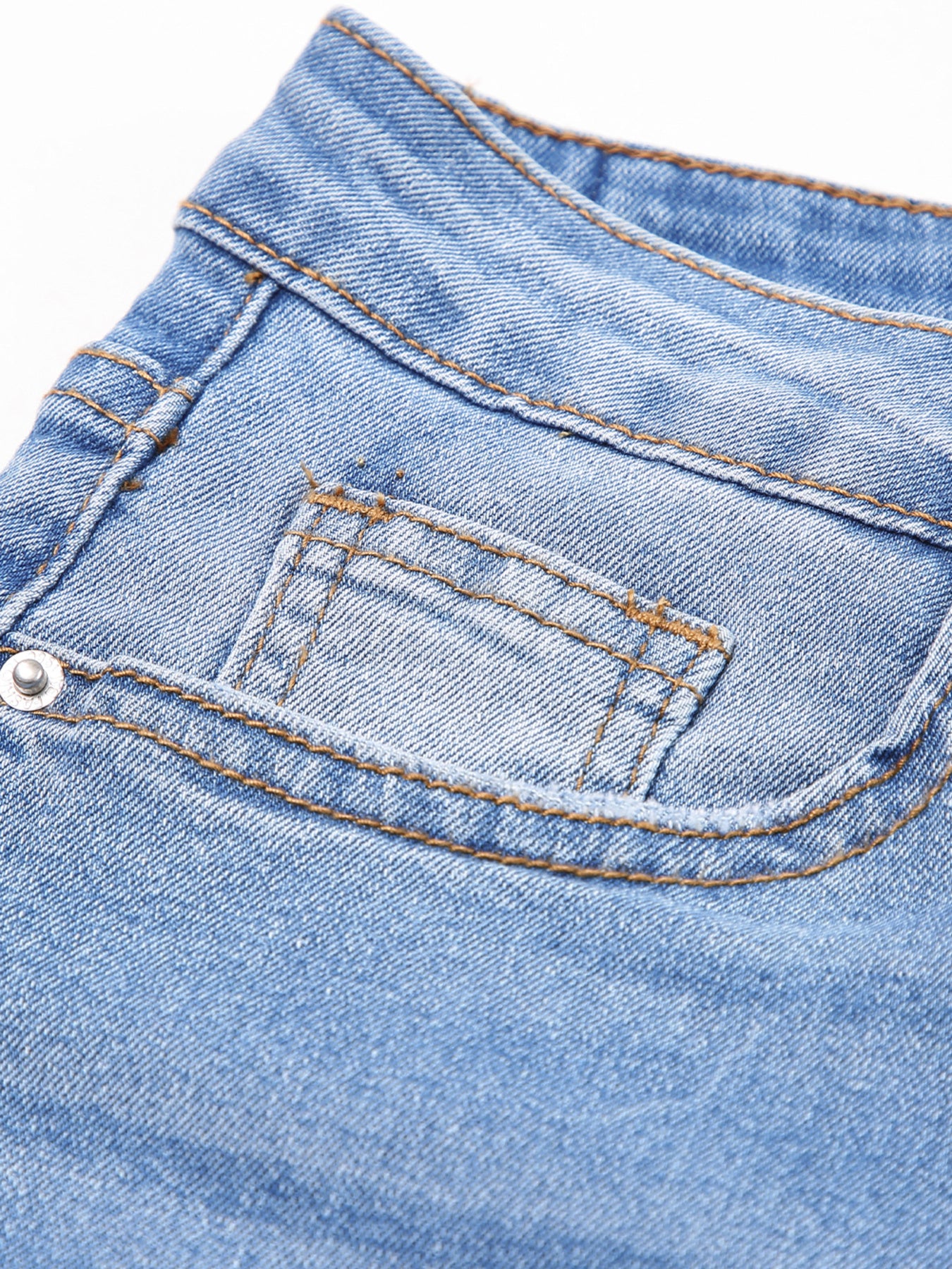 Light wash denim cropped jeans with whiskered details and contrast stitching.