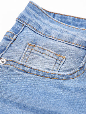 Light wash denim cropped jeans with whiskered details and contrast stitching.