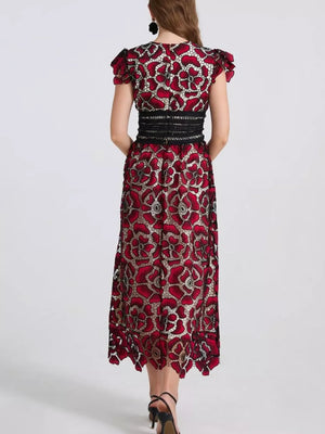 Burgundy floral lace midi dress with black waistband and cap sleeves.
