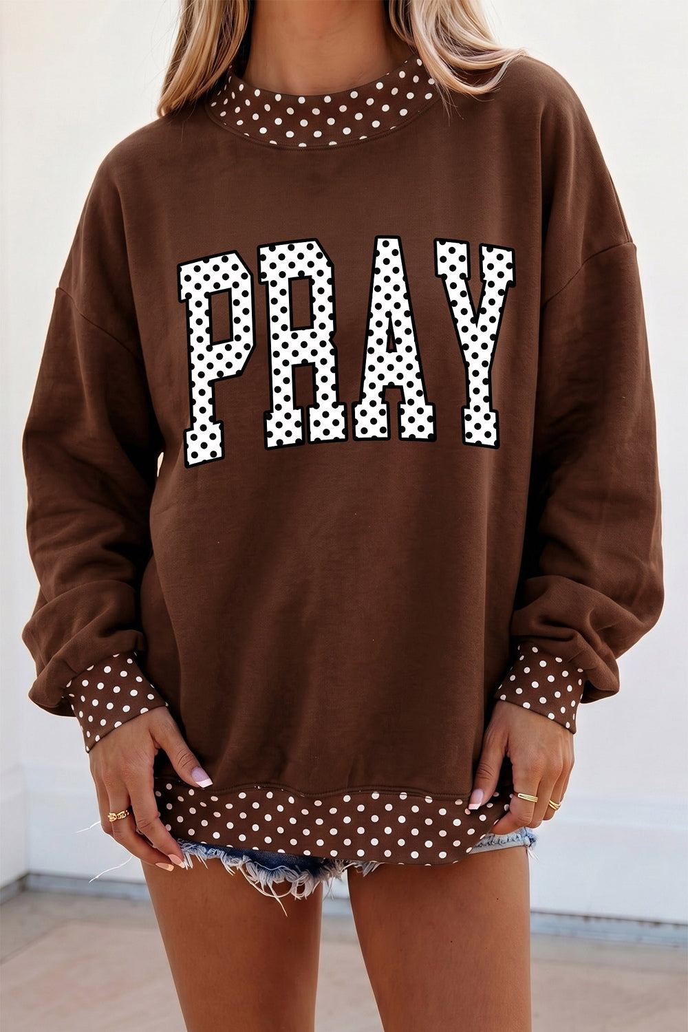 dark brown sweatshirt with polka dot and crew neck