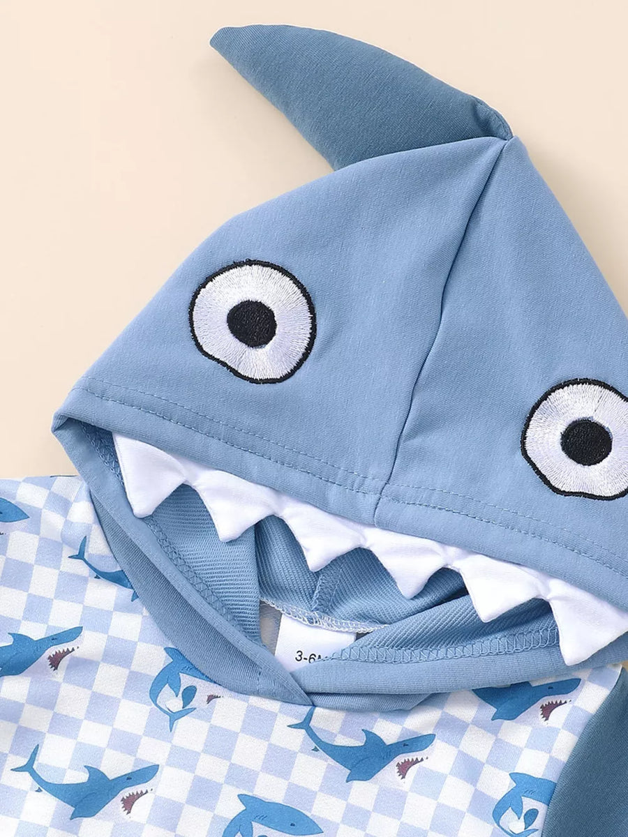 Blue baby hoodie with shark face hood and checkered shark print.