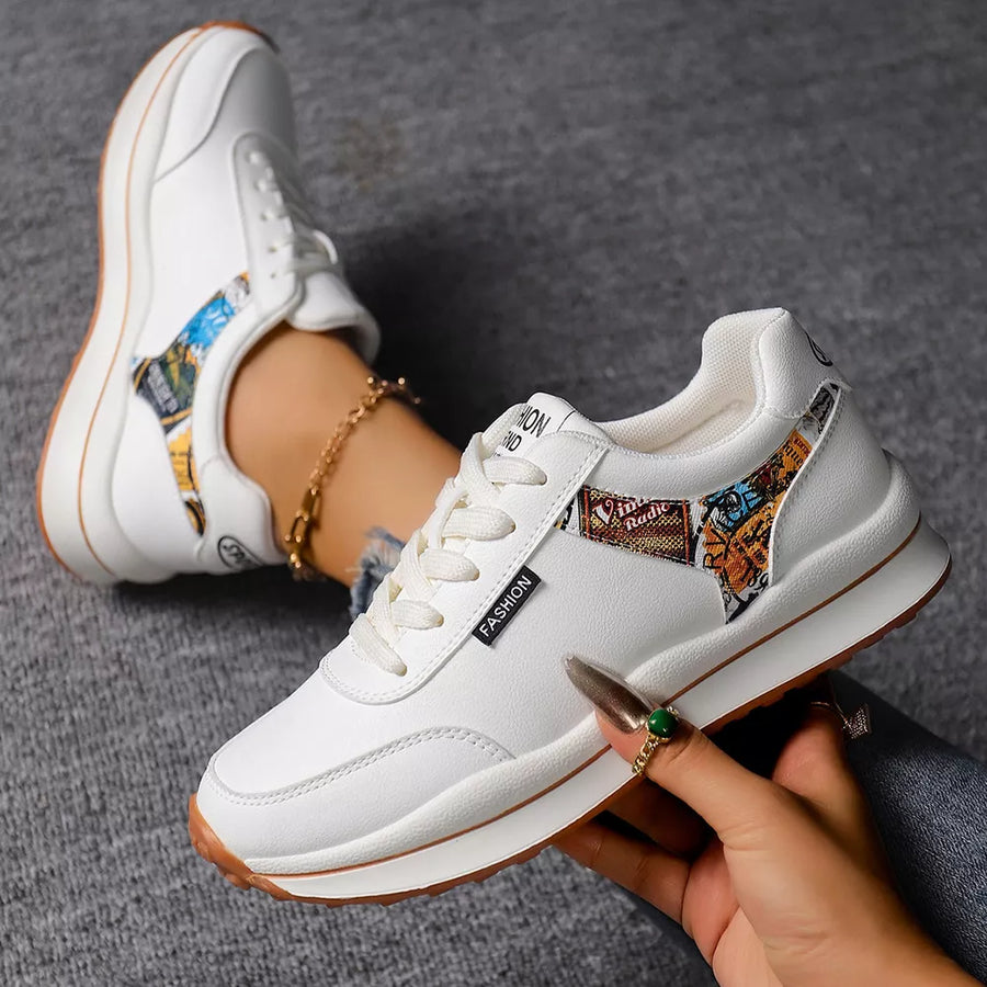 sneakers in black with graphic-print and round toe