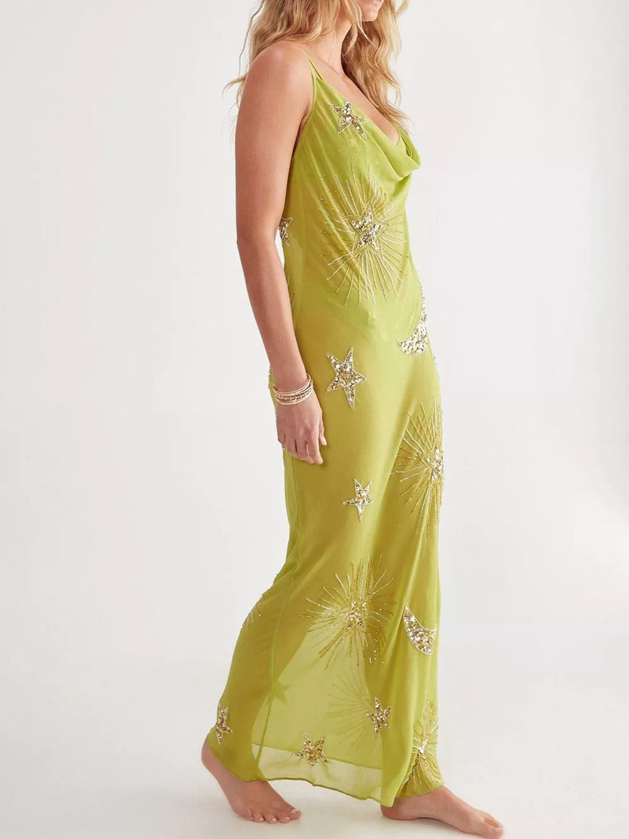 Sheer green celestial sequin cover-up dress with cowl neck and spaghetti straps.