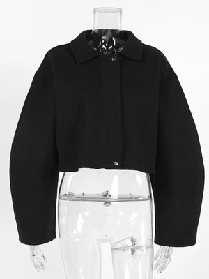black jacket with cropped and long sleeve