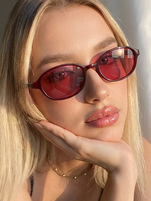sunglasses in burgundy featuring UV protection and oval fit