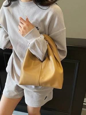 Knot Handle Medium Leather Handbag in Khaki with a slouchy silhouette and top handle.