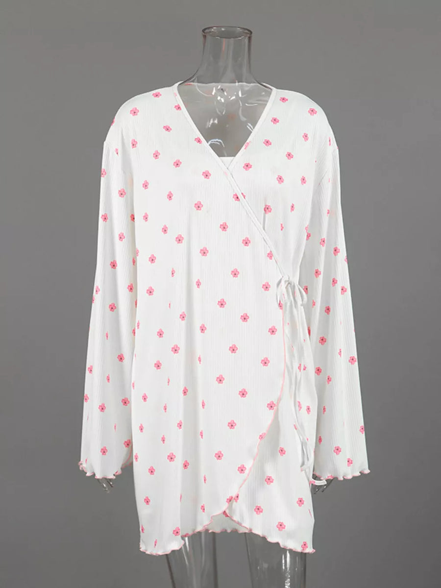 cream wrap dress with ruffled cuffs and long sleeve