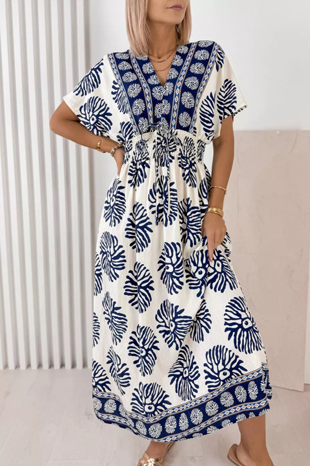 Blue floral print v-neck dolman dress with drawstring waist and ankle length