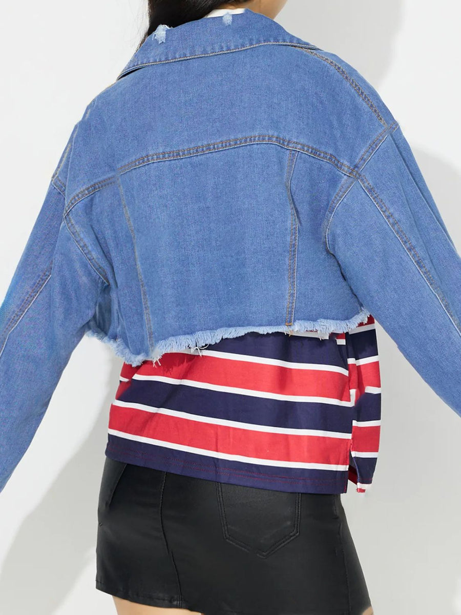 Medium wash denim trucker jacket with raw hem and collar.