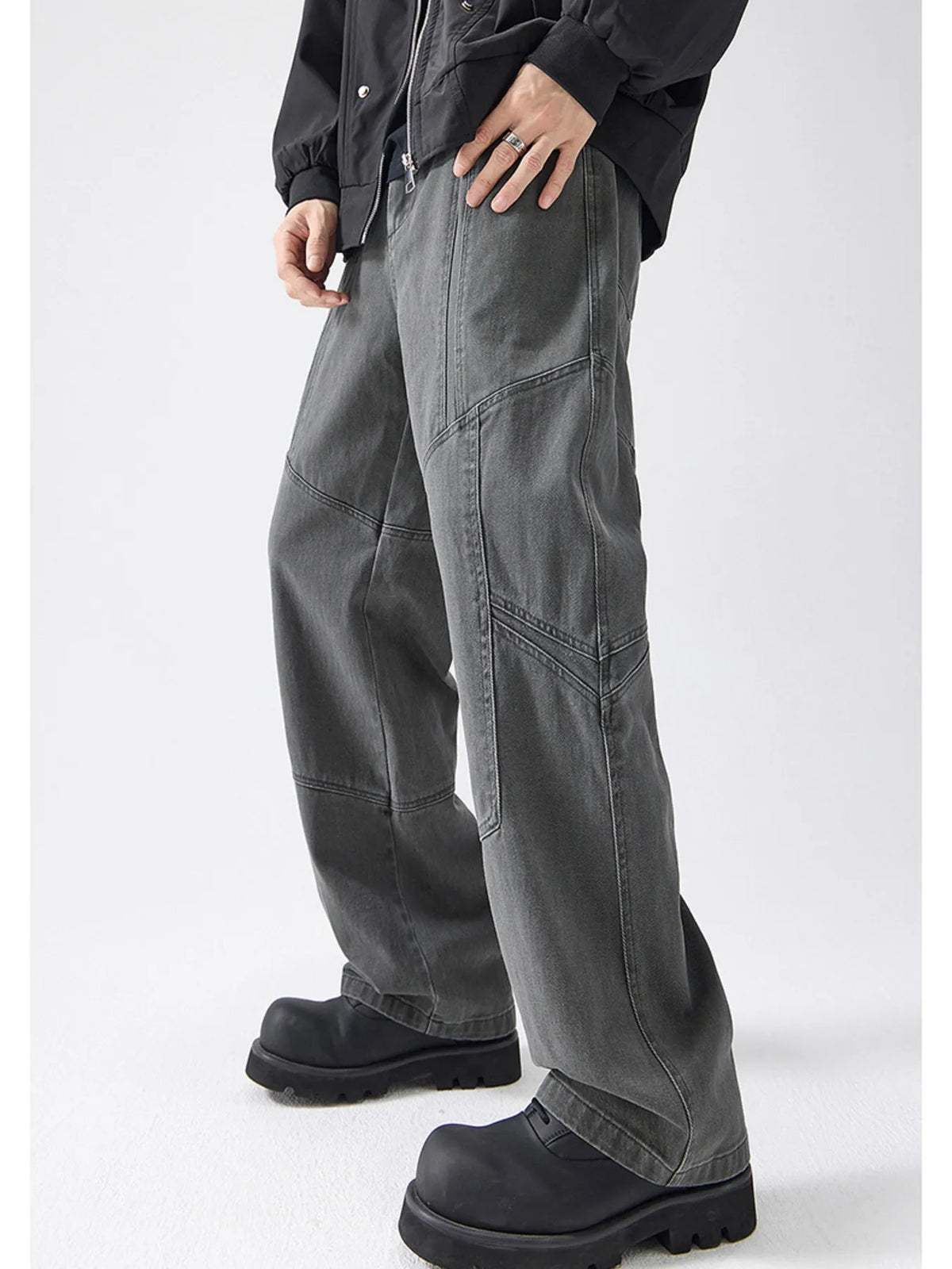 Gray cotton wide-leg trousers with panel stitching detail.