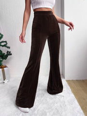 Dark brown corduroy high-waist flare maternity pants with bell bottoms.
