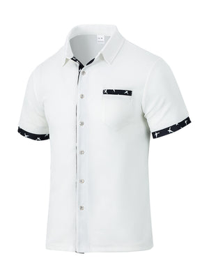 White waffle textured button-up shirt with star print trim on collar, pocket and sleeves.