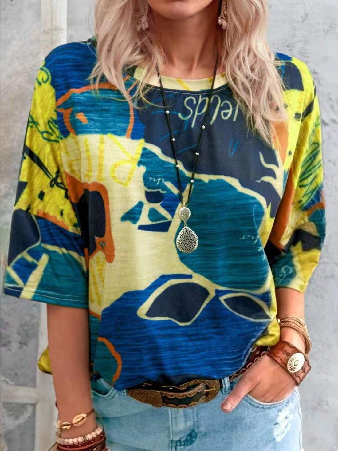 Brushstroke Stripe Casual T-Shirt in Geometric Yellow and blue with short sleeves and a crew neck.
