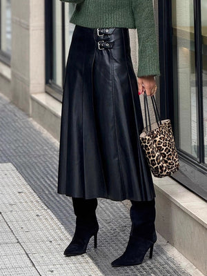 midi skirt in black featuring buckle detail and A-line fit