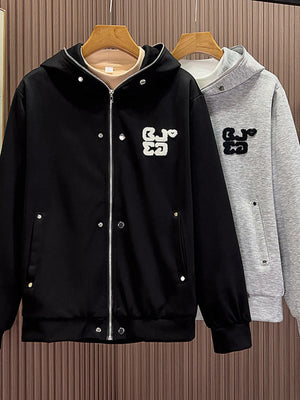 Men's black zippered hoodie with buttoned pockets and embroidered detail.